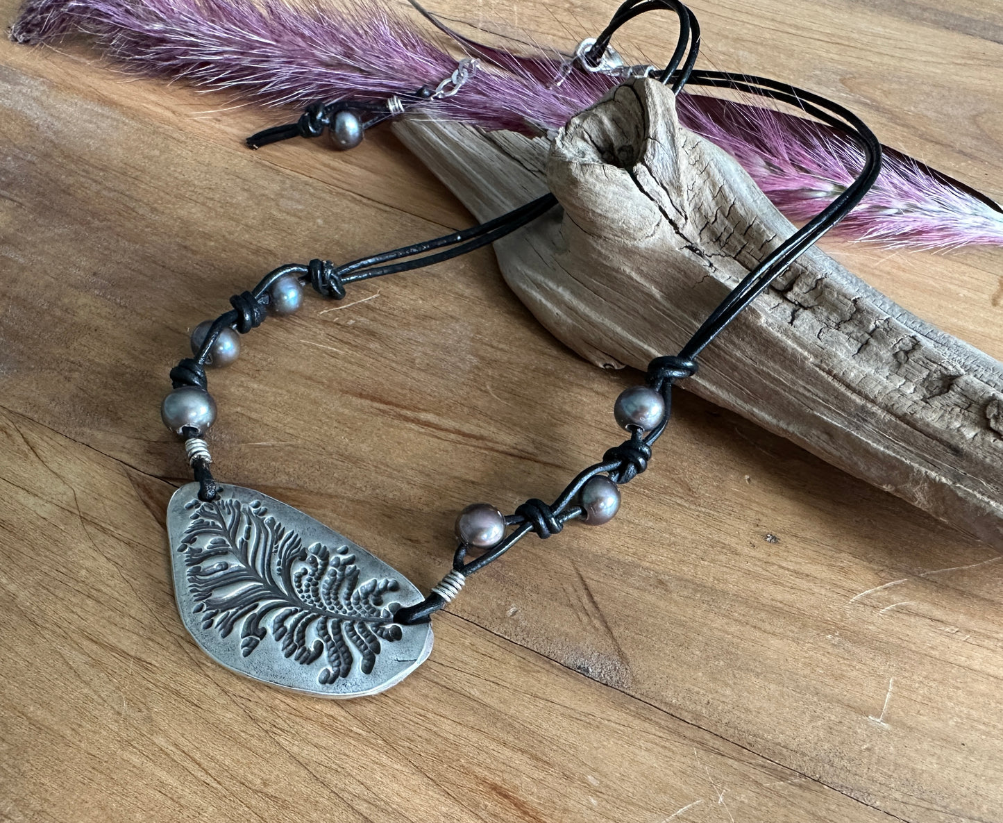 Leather and Freshwater Pearl Necklace with Feather Pendant