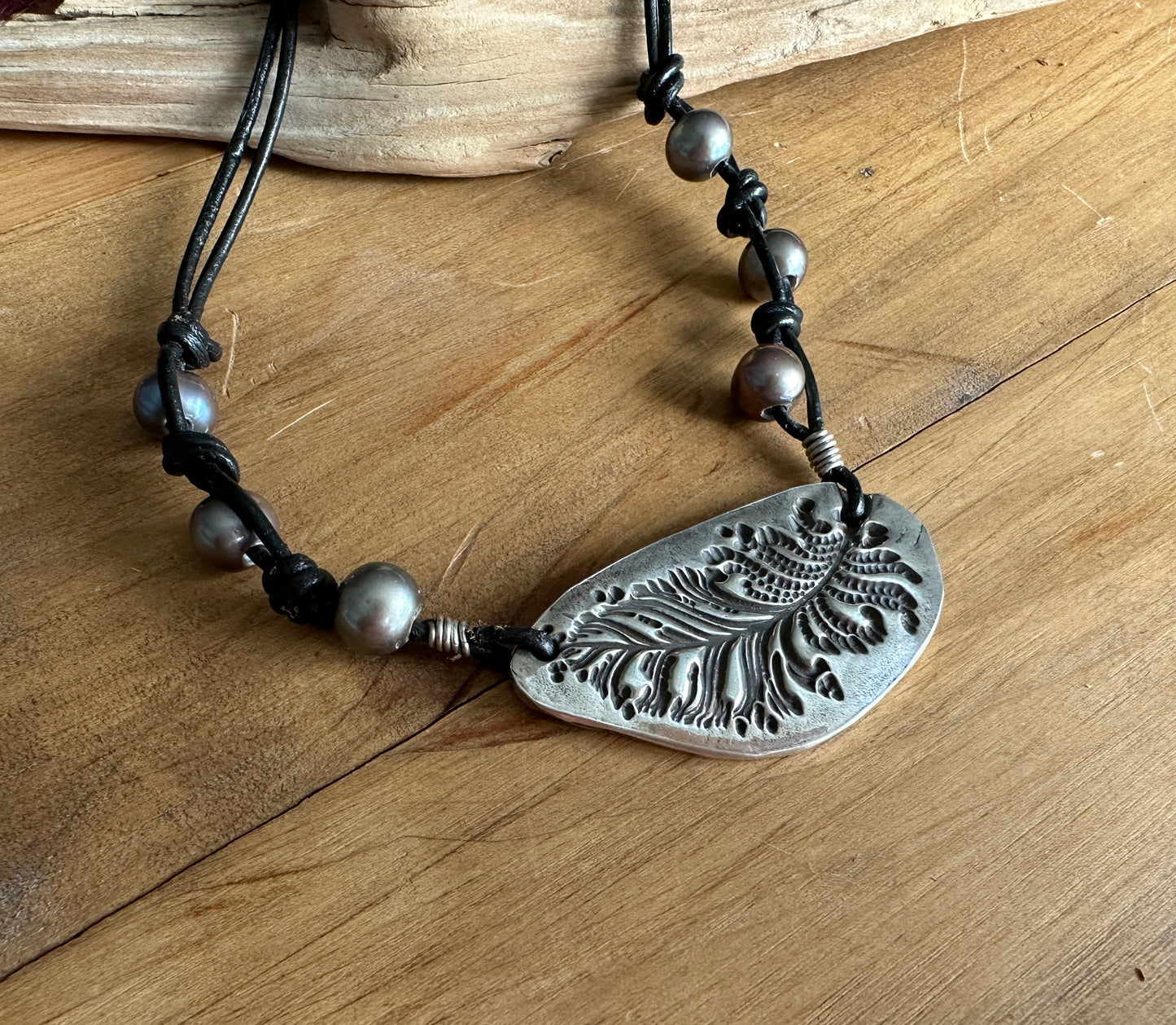 Leather and Freshwater Pearl Necklace with Feather Pendant