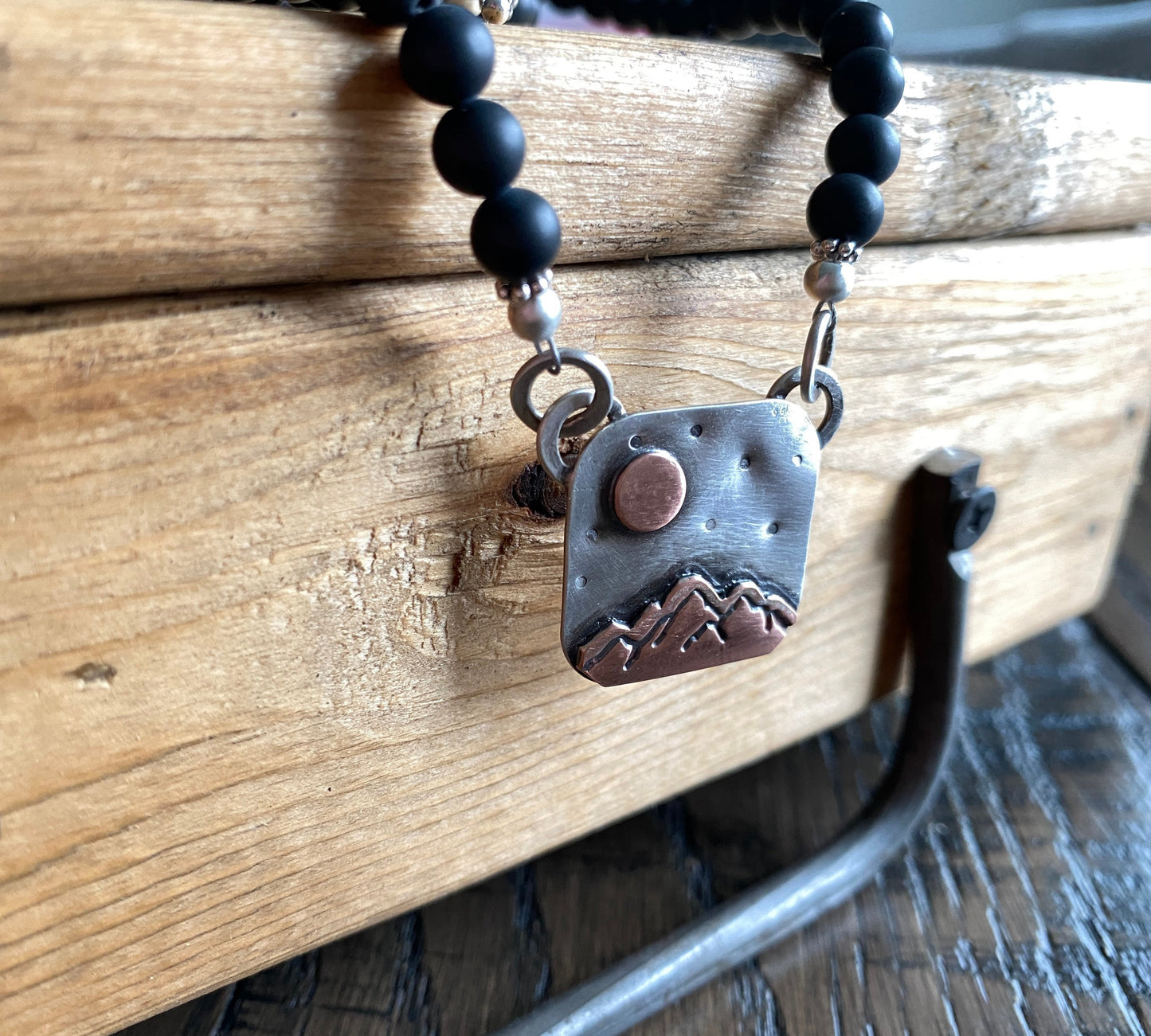 Under the Golden Moon necklace, black onyx necklace with sterling silver and copper mountain scene pendant, mixed metal jewelry